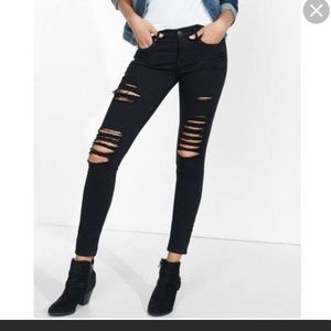 Express black mid rise distressed skinny jeans.